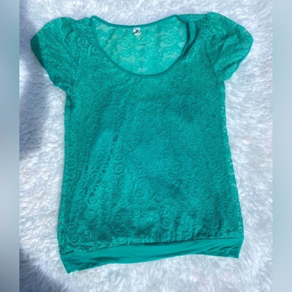 Studio Y Teal lace overlapping shirt underneath 
Sz. M